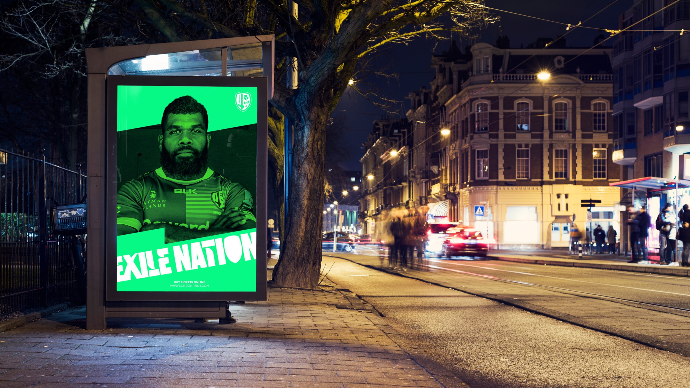 A branded poster concept promoting Exile Nation in bold neon green placed on a bus stop at night.