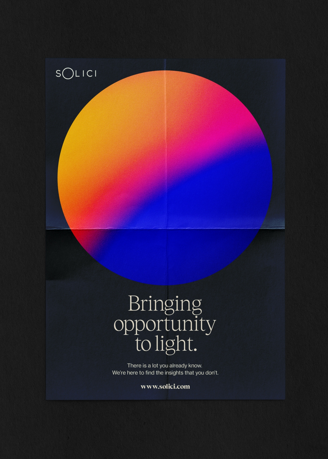 A single poster unfolded from quarters. Solici's circle dominates most of the page with gradiented colours of yellow, orange, pink and blue like an eclipse mixed with a sunset.