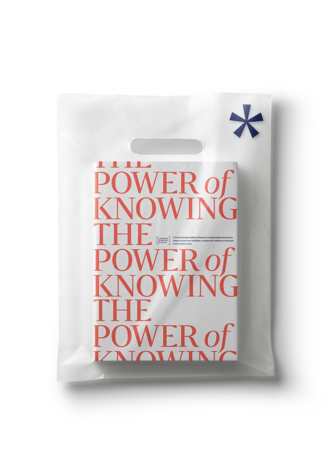 The power of knowing book wrapped placed upon a white paper bag