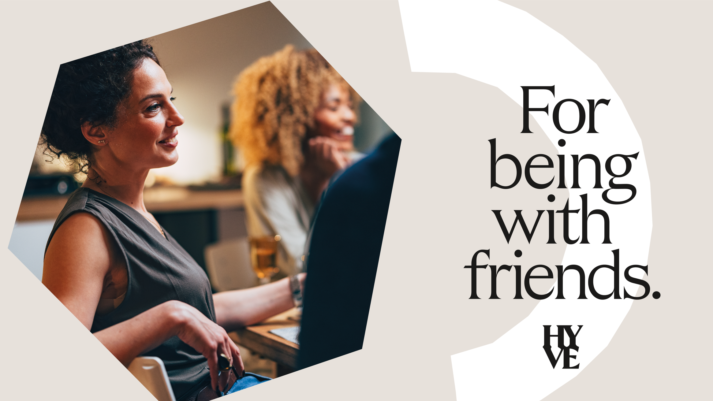 For being with friends image, cropped in a hexagon shape and on a grey background.