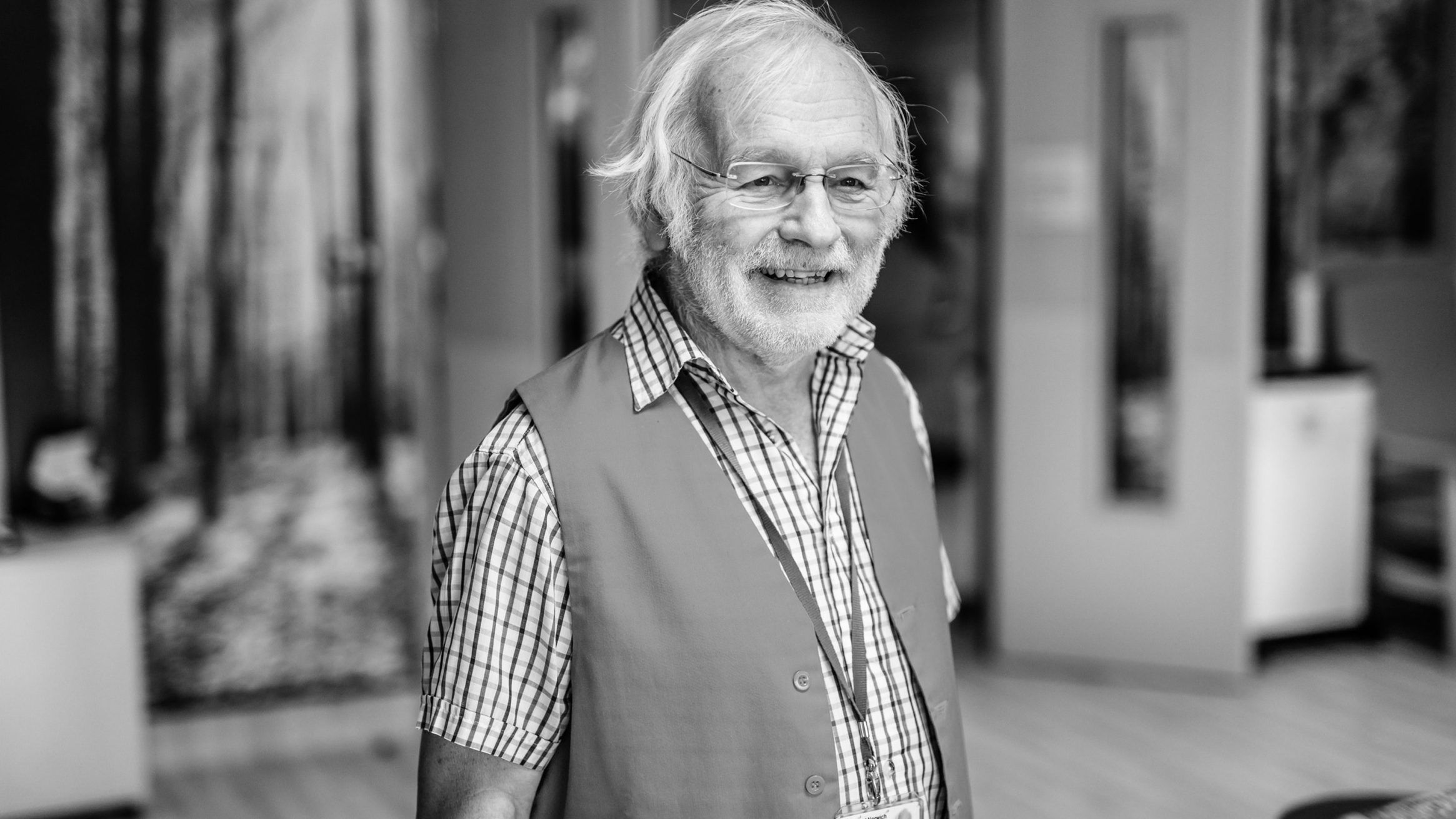 A smiling elderly gentleman.